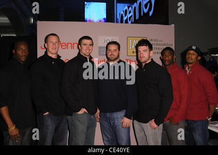 Deon Grant, Kevin Boss, Bear Pascoe, Shaun O'Hara, Matt Dodge, Guest and Corey Webster New York Pro Football players partner with Joseph Abboud and IAVA Veterans to distribute care packages for returning troops at JC Penney. New York City, USA - 07.12.10 Stock Photo