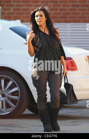 Kim Kardashian is seen wearing Ugg boots and an Hermes ...