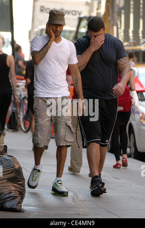 Swizz Beatz aka Kasseem Dean talking on his cell phone while walking to his gym in Manhattan New York City, USA - 08.09.10 Stock Photo