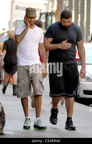 Swizz Beatz aka Kasseem Dean talking on his cell phone while walking to his gym in Manhattan New York City, USA - 08.09.10 Stock Photo