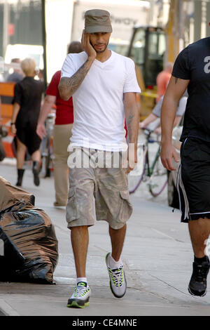 Swizz Beatz aka Kasseem Dean talking on his cell phone while walking to his gym in Manhattan New York City, USA - 08.09.10 Stock Photo