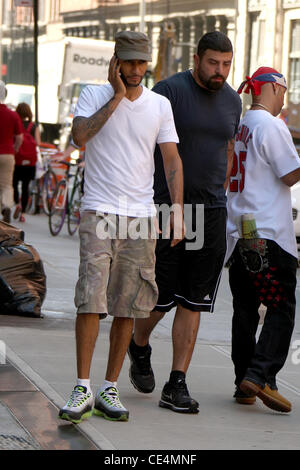 Swizz Beatz aka Kasseem Dean talking on his cell phone while walking to his gym in Manhattan New York City, USA - 08.09.10 Stock Photo