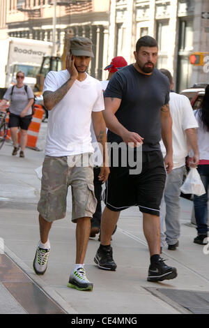 Swizz Beatz aka Kasseem Dean talking on his cell phone while walking to his gym in Manhattan New York City, USA - 08.09.10 Stock Photo