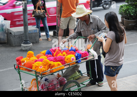 Toys sold on Sukhumvit Road, Bangkok, Thailand Stock Photo