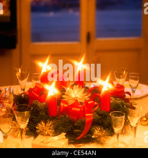 Candlelit Christmas dinner table Alsace  France, Europe Stock Photo