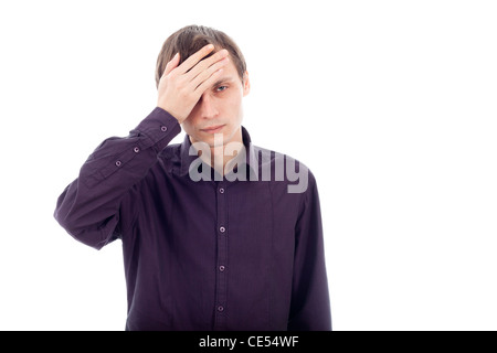 Portrait of man with headache, touching his head. Isolated on white background. Stock Photo