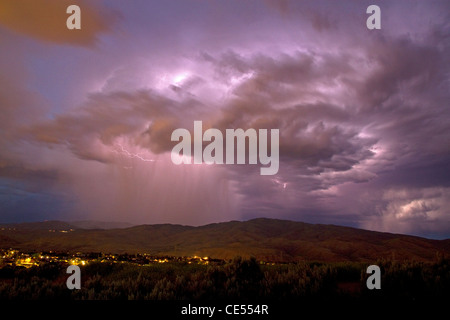 Lightning strikes during a thunderstorm on the first day of summer in Boise, Idaho, USA. Stock Photo