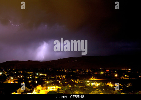 Lightning strikes during a thunderstorm on the first day of summer in Boise, Idaho, USA. Stock Photo