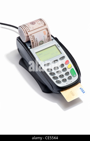American bank notes coming out of a credit card machine Stock Photo