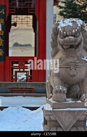 Stone Lion sculpture, symbol of protection & power in Oriental Asia Stock Photo