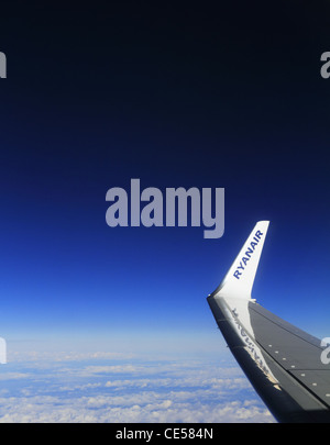 The wing tip logo of budget airline Ryanair Boeing 737 800 aircraft airplane plane in flight. Stock Photo