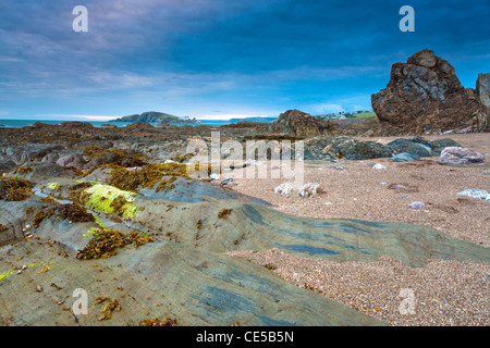 Rocky shores of Bantham at Dusk, Bantham, South Devon, England, United Kingdom, Europe  Stock Photo