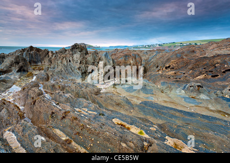 Rocky shores of Bantham at Dusk, Bantham, South Devon, England, United Kingdom, Europe  Stock Photo