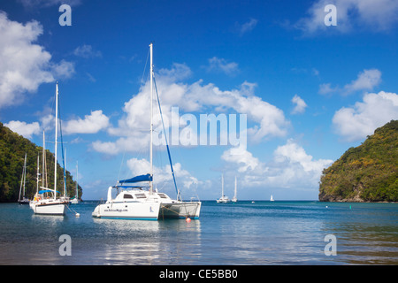 Boats in the tiny harbor at Marigot Bay on the west coast of St. Lucia, West Indies Stock Photo