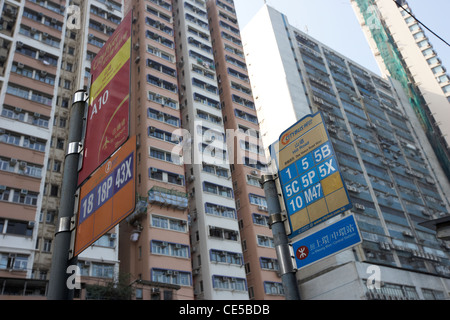 local and airport bus stops in front of apartment buildings hong kong hksar china asia Stock Photo