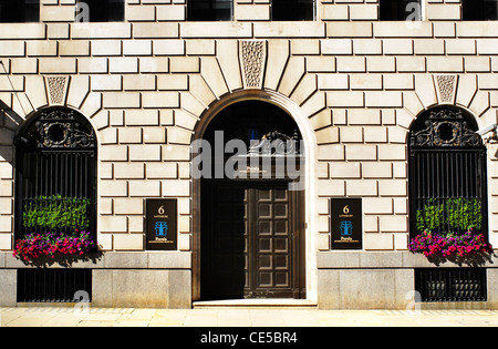 Window boxes and facade of the Persia International Bank plc in the City of London financial district  in London, England, UK. Stock Photo