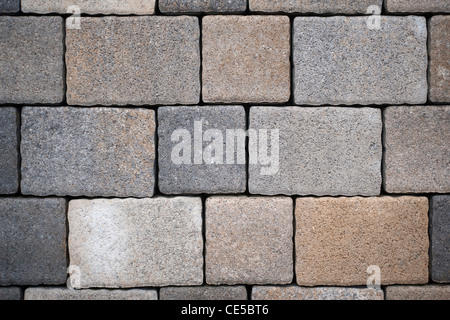 Background from paving stones, rectangular stones in gray shades of color Stock Photo