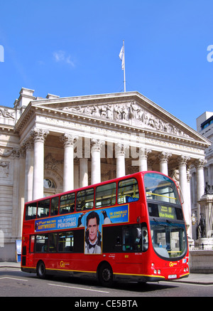 Red double-decker bus passing the Royal Exchange in London, England, on a sunny Summer Sunday. Stock Photo
