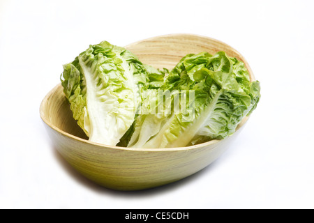 Romaine lettuce in a bowl on white background Stock Photo