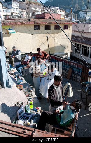 Barber shop in the open air, Mussoorie, Uttarakhand, India Stock Photo