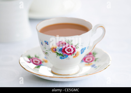 Tea served in a vintage teacup Stock Photo