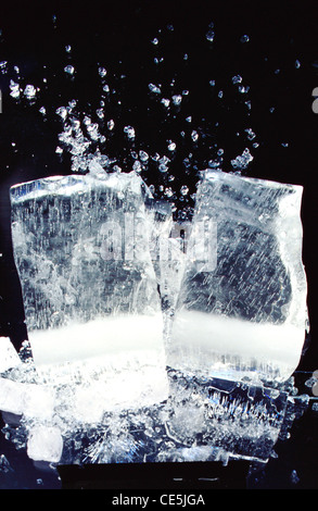Ice cubes ; cold frozen water Stock Photo