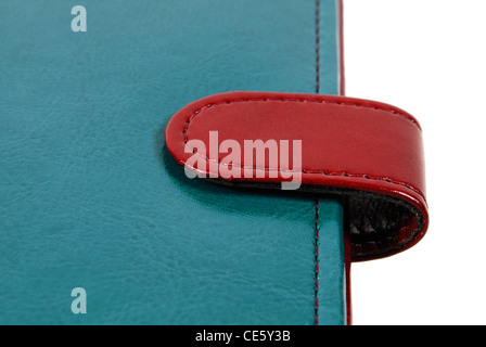 Blue and red leather organizer closeup, isolated on white Stock Photo