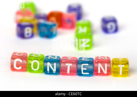 Text Content on colorful wooden cubes over white Stock Photo