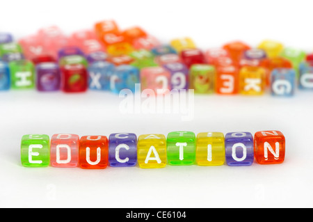 Text Education on colorful wooden cubes over white Stock Photo