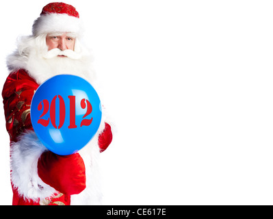 Traditional Santa Claus holding balloons for children. Isolated on white. Stock Photo