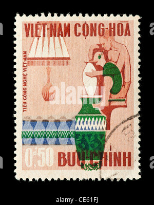 Postage stamp from (South) Vietnam depicting a potter with vases and lamp. Stock Photo