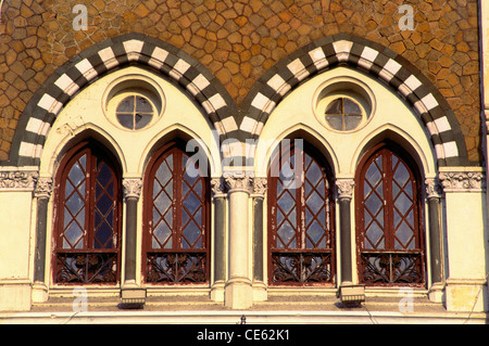 Decorative arched windows and stone wall of David Sasson Library Bombay Mumbai Maharashtra India Stock Photo