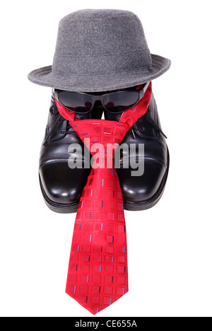 black shoes with tie and hat isoalted on white background Stock Photo