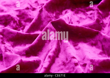 Purple velvet cloth ; background ; texture ; shining ; Stock Photo