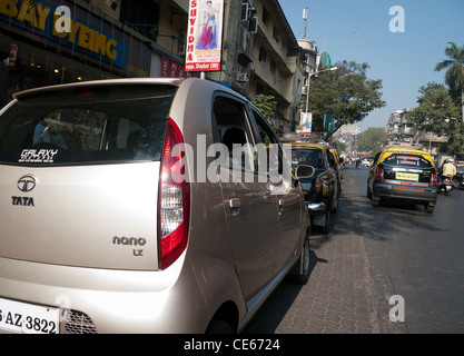 A Tata Nano car on the street in Mumbai India Stock Photo