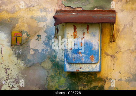 Colorful old wall with paint peeling off Stock Photo