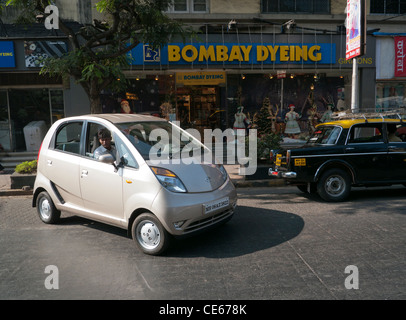A Tata Nano car on the street in Mumbai India Stock Photo