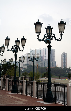 Venetian lampposts outside the Venetian Casino and Hotel Complex with the City of Dreams behind Cotai Strip Macau SAR China Stock Photo