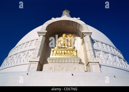 Golden idol of Buddha ; Vishwa Shanti stupa ; Rajgir ; Bihar ; India Stock Photo