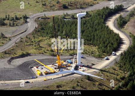 Aerial view of a wind turbine blade about to be lifted by a crane Stock Photo