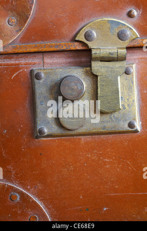 Detail of lock on old vintage suitcase made by Antler Stock Photo