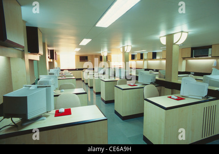Empty office interior with computer desks Stock Photo