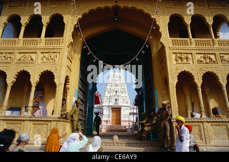 temple through haveli entrance door in Pushkar fair ; Rajasthan ; India Stock Photo