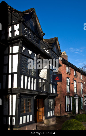 Former Jacobean Priests House now a Bank in Prestbury Village Cheshire Stock Photo