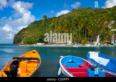 Boats in the tiny harbor at Marigot Bay on the west coast of St. Lucia, West Indies Stock Photo