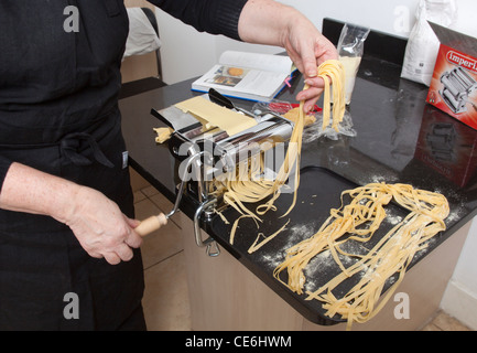 Making Fresh pasta with an Imperia Pasta Machine Stock Photo