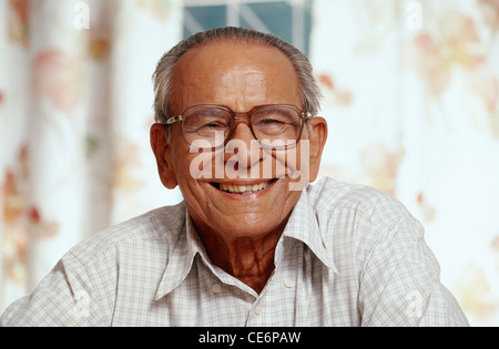 Indian seniors old man portrait smiling wearing glasses ; India ; asia ; MR#318 Stock Photo