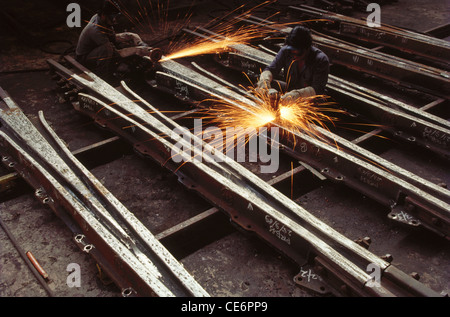 Welding work of railway tracks in factory ; india Stock Photo