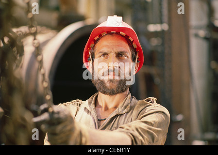 Industrial worker wearing safety helmet ; india ; asia Stock Photo