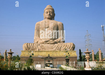 Giant Buddha statue ; Buddha sitting in meditation ; dhyana mudra ; on lotus in open ; Bodh Gaya ; Bihar ; India ; Asia Stock Photo